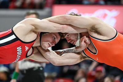 WRESTLINGvsOKST_OrineLocksArms_HW